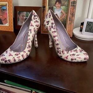 Irregular choice 38 but US7. White with a cute purple print